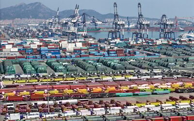 Cars and other vehicles for export are seen at a port in Yantai, in eastern China's Shandong province on April 3, 2025. (AFP)