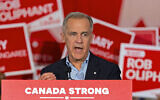Canadian Prime Minister Mark Carney speaks during a campaign rally in Toronto, on April 4, 2025. (Peter Power/AFP)