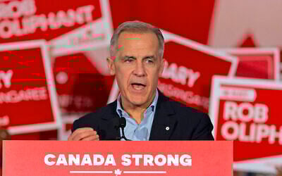Canadian Prime Minister Mark Carney speaks during a campaign rally in Toronto, on April 4, 2025. (Peter Power/AFP)
