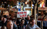 Demonstrators gather with placards during an anti-government protest calling for action to secure the release of hostages held captive since the October 7, 2023, attacks by Gazan Palestinian terrorists, outside the prime minister's residence in Jerusalem, on April 5, 2025. (Hazem Bader / AFP)