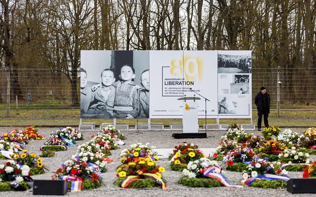 Wreaths of flowers lay in front of a placard on the occasion of the 80th anniversary of the liberation of the Buchenwald Nazi concentration camp prior a commemoration ceremony in Buchenwald, near Weimar, eastern Germany, April 6, 2025. (JENS SCHLUETER / AFP) Wreaths of flowers lay in front of a placard on the occasion of the 80th anniversary of the liberation of the Buchenwald Nazi concentration camp prior a commemoration ceremony in Buchenwald, near Weimar, eastern Germany, April 6, 2025. (JENS SCHLUETER / AFP)