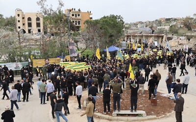 Mourners attend a funeral for Hezbollah fighters killed during fighting last year in Taybeh, Lebanon, on April 6, 2025. (Rabih DAHER / AFP) Mourners attend a funeral for Hezbollah fighters killed during fighting last year in Taybeh, Lebanon, on April 6, 2025. (Rabih DAHER / AFP)