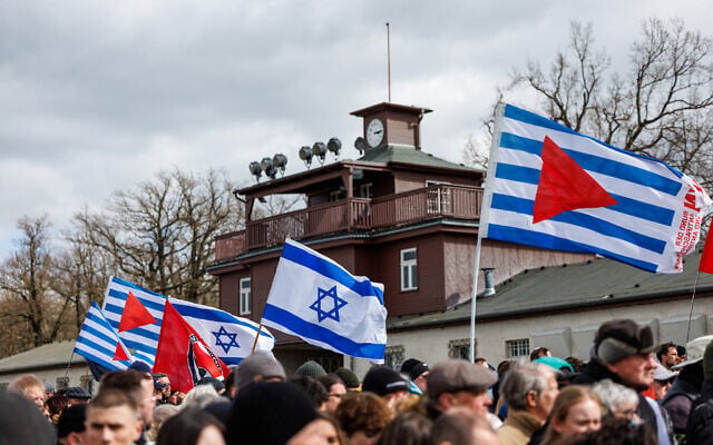 People attend the commemoration to mark the 80th anniversary of the liberation of the Buchenwald Nazi concentration camp at the camp's memorial site in Buchenwald, near Weimar, eastern Germany, on April 6, 2025. (JENS SCHLUETER / AFP / File)