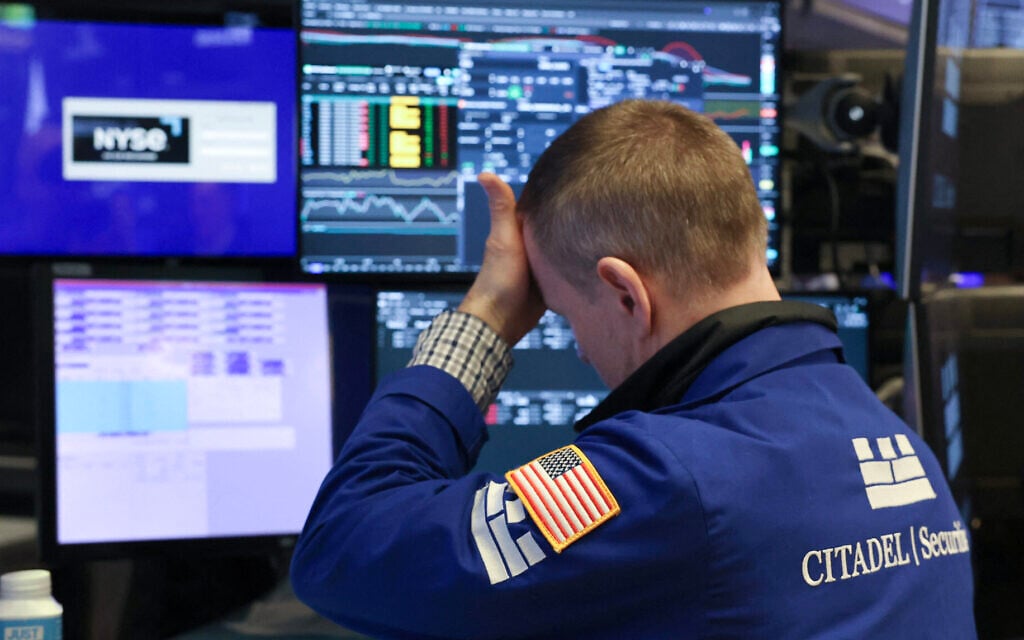 A trader works on the floor of the New York Stock Exchange in New York City, on April 7, 2025. Wall Street stocks opened sharply lower Monday, joining a global selloff on worries that a trade war induced by US President Donald Trump's tariffs will spark a global economic slowdown. (Photo by TIMOTHY A. CLARY / AFP) A trader works on the floor of the New York Stock Exchange in New York City, on April 7, 2025. Wall Street stocks opened sharply lower Monday, joining a global selloff on worries that a trade war induced by US President Donald Trump's tariffs will spark a global economic slowdown. (Photo by TIMOTHY A. CLARY / AFP)