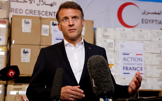 France's President Emmanuel Macron delivers a speech in front of humanitarian aid destined to Gaza, at the Egyptian Red Crescent warehouse in el-Arish in the north of the Sinai Peninsula, on April 8, 2025. (Ludovic Marin/Pool/AFP) France's President Emmanuel Macron delivers a speech in front of humanitarian aid destined to Gaza, at the Egyptian Red Crescent warehouse in el-Arish in the north of the Sinai Peninsula, on April 8, 2025. (Ludovic Marin/Pool/AFP)