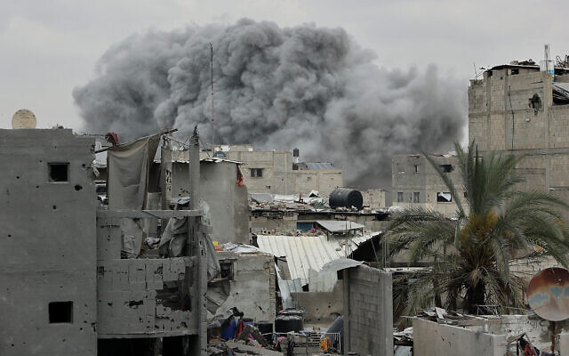 Smoke billows at the site of an Israeli strike on Gaza City's Shujaiyya neighborhood, on April 9, 2025. (Omar Al-Qattaa / AFP)