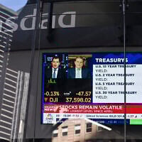 A television screen displays market news at the NASDAQ MarketSite in Times Square, New York City on April 9, 2025. (ANGELA WEISS / AFP)