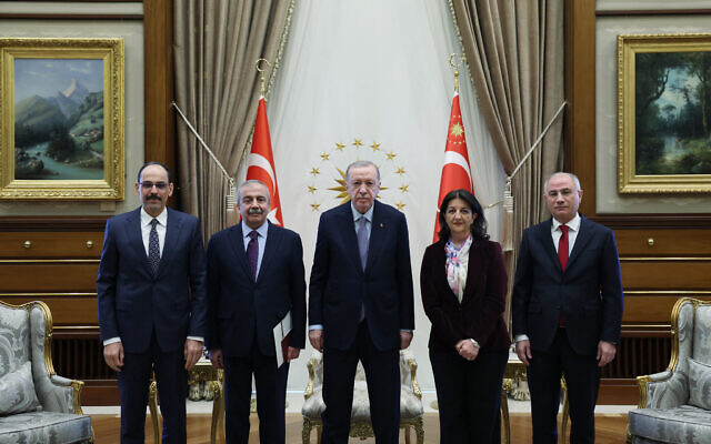 Turkish President Recep Tayyip Erdogan (R) as he meets with MP's of pro-Kurdish Equality and Democracy (DEM) Party Pervin Buldan (2R) and Sirri Sureyya Onder (2L) and Turkey's National Intelligence Organization (MIT) Ibrahim Kalin (L) and AKP Deputy Chairman Efkan Ala (R) at the Presidential Complex in Ankara, Turkey, April 10, 2025. (HANDOUT / TURKISH PRESIDENTIAL PRESS SERVICE / AFP)