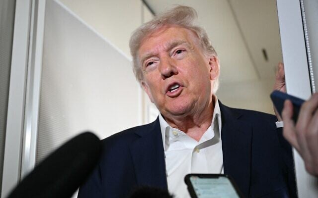 US President Donald Trump speaks to reporters aboard Air Force One, en route to Palm Beach International Airport in West Palm Beach, Florida, on April 11, 2025. (Mandel Ngan/AFP) US President Donald Trump speaks to reporters aboard Air Force One, en route to Palm Beach International Airport in West Palm Beach, Florida, on April 11, 2025. (Mandel Ngan/AFP)