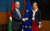 PA Prime Minister Mohammad Mustafa (L) shakes hands with EU High Representative and Vice-President for Foreign Affairs and Security Policy Kaja Kallas (R) ahead of a European Union Foreign Affairs Council meeting at the European Convention Center Luxembourg (ECCL) in Luxembourg City, on April 14, 2025. (JOHN THYS / AFP)