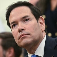 US Secretary of State Marco Rubio listens as President Donald Trump meets with El Salvador's President Nayib Bukele in the Oval Office of the White House in Washington, April 14, 2025. (Brendan Smialowski/AFP)