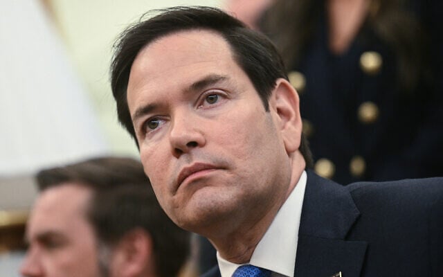 US Secretary of State Marco Rubio listens as President Donald Trump meets with El Salvador's President Nayib Bukele in the Oval Office of the White House in Washington, April 14, 2025. (Brendan Smialowski/AFP)