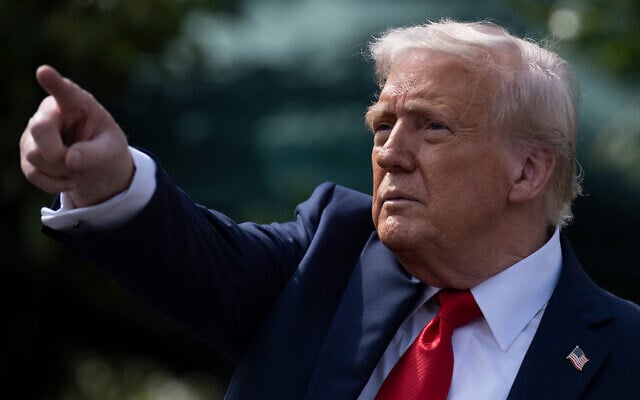 US President Donald Trump gestures after hosting the 2025 College Football National Champions, Ohio State Buckeyes, celebrating the team's title-winning season with a ceremony on the South Lawn of the White House in Washington, DC, April 14, 2025. (Brendan Smialowski / AFP)
