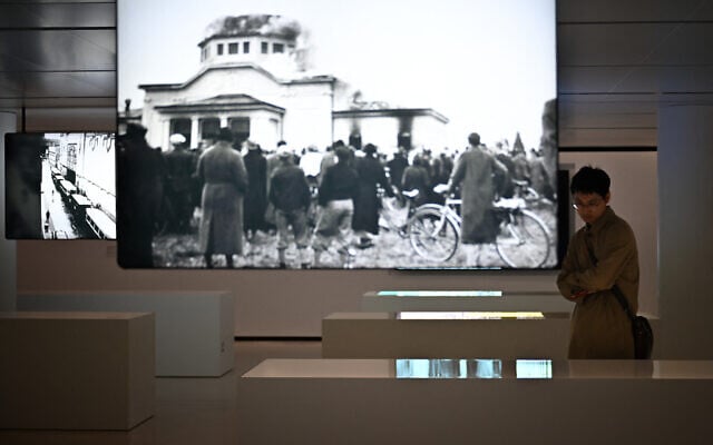 Visitors discover the new room dedicated to the Holocaust, three days after its opening, at the Memorial of Caen, northwestern France, on April 4, 2025. (Lou Benoist/AFP)