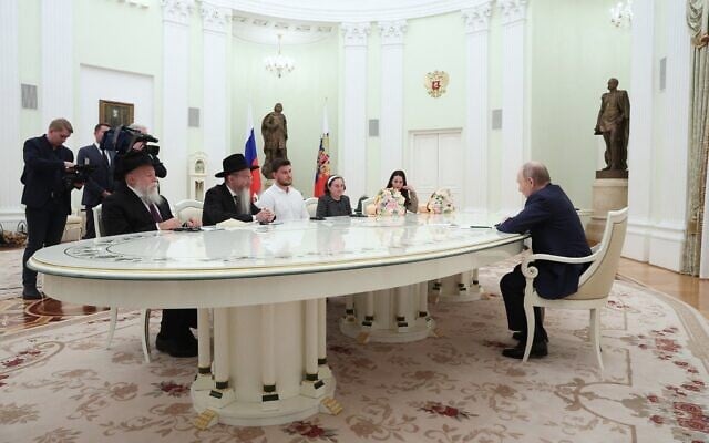 In this pool photograph distributed by the Russian state agency Sputnik, Russia's President Vladimir Putin meets with freed Palestinian Islamic Jihad and Hamas hostages Sasha Troufanov, Elena Trufanova and Sapir Cohen at the Kremlin in Moscow on April 16, 2025. (Sofia Sandurskaya/Pool/AFP) In this pool photograph distributed by the Russian state agency Sputnik, Russia's President Vladimir Putin meets with freed Palestinian Islamic Jihad and Hamas hostages Sasha Troufanov, Elena Trufanova and Sapir Cohen at the Kremlin in Moscow on April 16, 2025. (Sofia Sandurskaya/Pool/AFP)