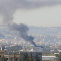 Smoke rises from the site of an Israeli strike in Ghazieh, near Sidon, on April 18, 2025. (Mahmoud Zayyat / AFP)