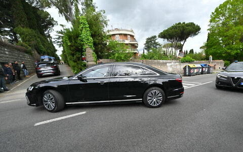 Vehicles of the Iranian delegation are escorted by Italian police at one of the entrance of the Omani embassy in Rome where a second round of nuclear talks between Iran and the United States will be held on April 19, 2025 (Andreas SOLARO / AFP)