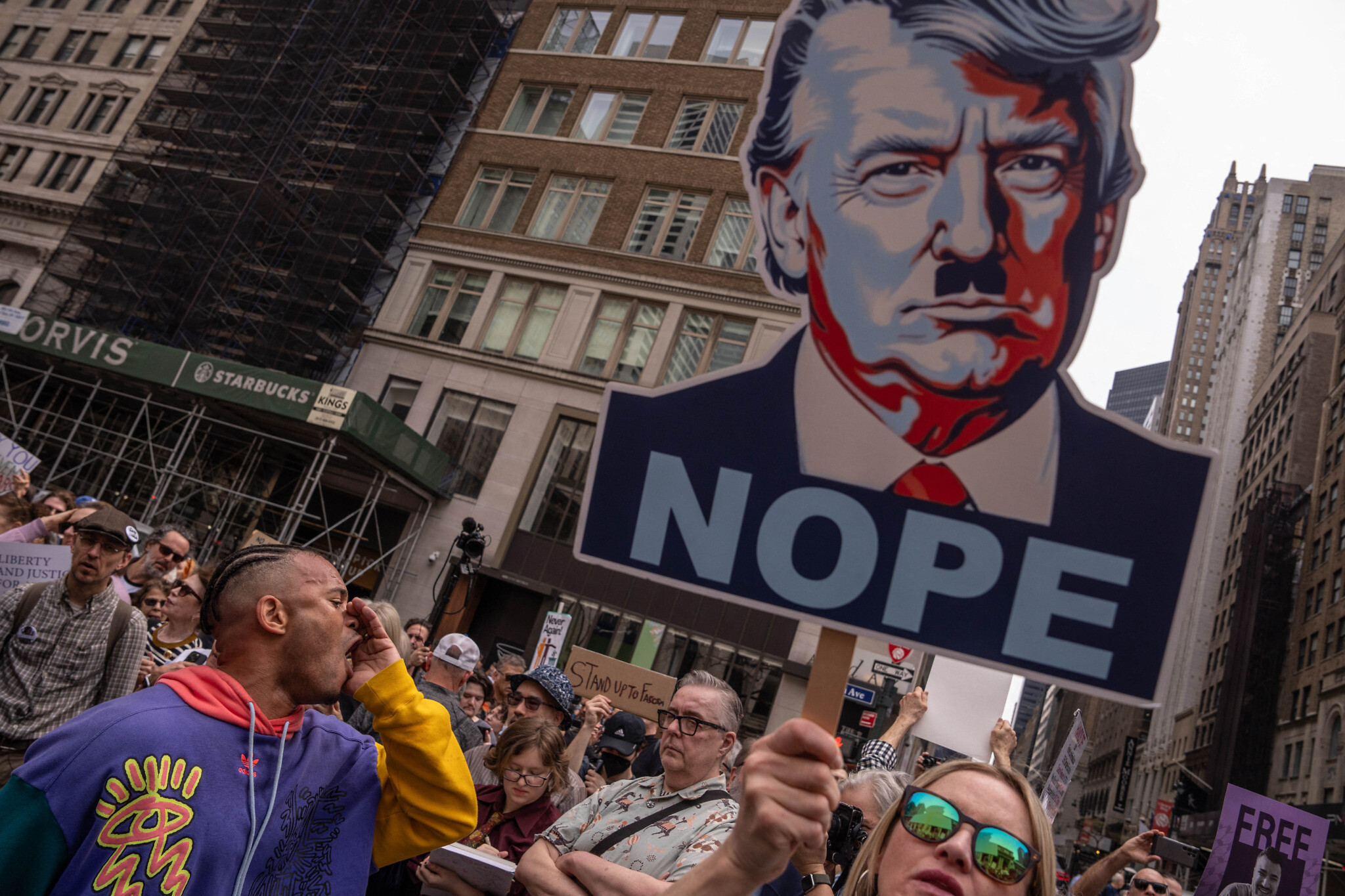 Another round of anti-Trump protests hits US cities, with some likening him to Hitler
