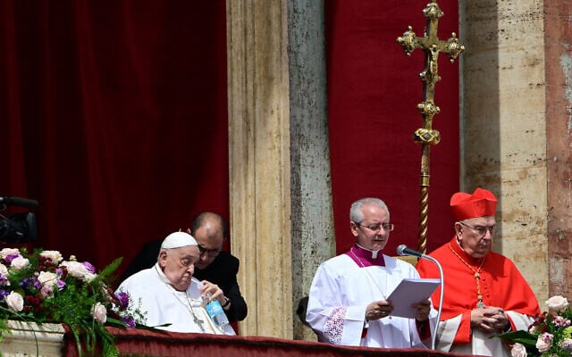 Pope Francis sips water with a straw on the main balcony of St. Peter's basilica during the Urbi et Orbi message and blessing to the city and the world as part of Easter celebrations, at St Peter's square in the Vatican on April 20, 2025. (Tiziana FABI / AFP) Pope Francis sips water with a straw on the main balcony of St. Peter's basilica during the Urbi et Orbi message and blessing to the city and the world as part of Easter celebrations, at St Peter's square in the Vatican on April 20, 2025. (Tiziana FABI / AFP)