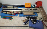 A handout picture provided by the Lebanese armed forces on April 20, 2025, shows weapons that the army said were seized after troops searched an apartment in the Sidon-Zahrani area in southern Lebanon. (Lebanese Armed Forces / AFP)