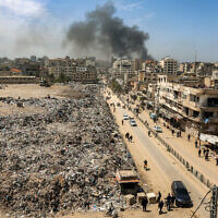 Mounds of trash are seen at the former site of the Firas Market in Gaza City, which was transformed into a landfill during the war, on April 21, 2025. (Omar AL-QATTAA / AFP)
