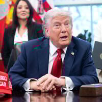 US President Donald Trump speaks to the media after signing executive orders relating to higher education institutions in the Oval Office of the White House in Washington, DC, on April 23, 2025. (SAUL LOEB / AFP)