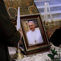 Christian worshippers attend a memorial mass for the late Pope Francis at the Melkite Greek Catholic Cathedral of St Elias in Israel's northern city of Haifa on April 24, 2025. (Jalaa Marey / AFP)
