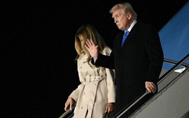 US President Donald Trump, right, and First Lady Melania Trump step off Air Force One upon arrival at Leonardo da Vinci International Airport in Rome, Italy, April 25, 2025. (Mandel Ngan/AFP)