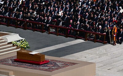 The book of the gospels lays on the coffin of late Pope Francis during the funeral ceremony at St Peter's Square in the Vatican on April 26, 2025. (Photo by Tiziana FABI / AFP)