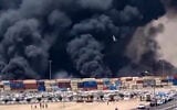 This image grab taken from footage released by the state television Islamic Republic of Iran Broadcasting News (IRIBNEWS) on April 26, 2025 shows thick black smoke billowing following an explosion at the Shahid Rajaee port dock southwest of Bandar Abbas (Photo by IRIBNEWS / AFP)