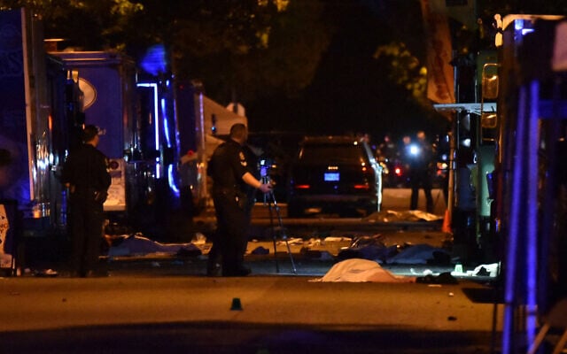 Vancouver Police investigate a crime scene after a man drove into pedestrians at the annual Lapu Lapu festival celebrating Filipino culture, at East 43rd Avenue and Fraser, in the south of Vancouver, Canada, on April 26, 2025. (Don MacKinnon / AFP)