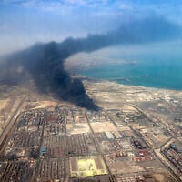 This handout picture provided by the media office of the Iranian presidency shows heavy smoke billowing at the site of an explosion that took place a day earlier in Bandar Abbas in the Iranian province of Hormozgan on April 27, 2025. (Iranian Presidency / AFP)