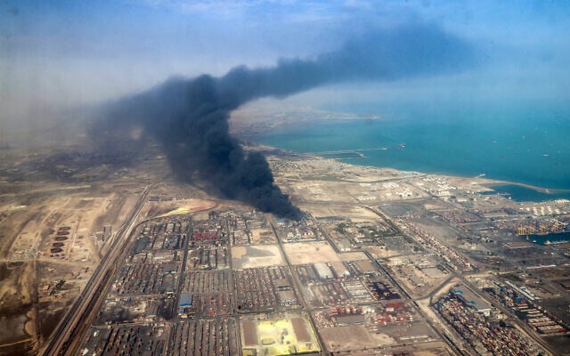This handout picture provided by the media office of the Iranian presidency shows heavy smoke billowing at the site of an explosion that took place a day earlier in Bandar Abbas in the Iranian province of Hormozgan on April 27, 2025. (Iranian Presidency / AFP)