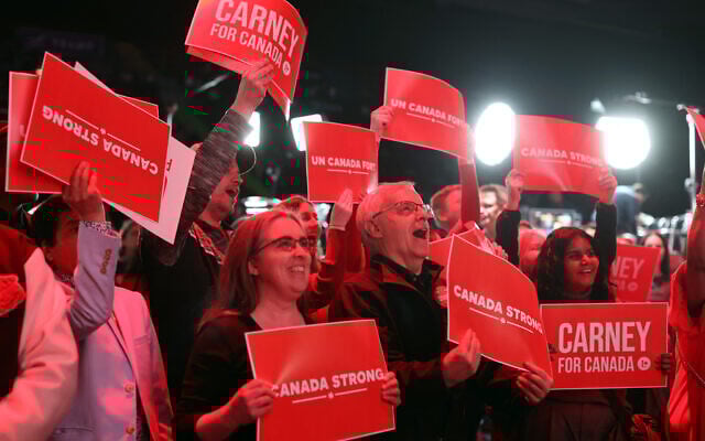 Supporters for Canada's Prime Minister and Liberal Party leader Mark Carney celebrate as results are announced during an election party in Ottawa, Canada April 28, 2025. (Dave Chan / AFP)