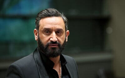 French TV host Cyril Hanouna attends a session before the parliamentary commission of inquiry into the allocation of TV frequencies, at the National Assembly in Paris on March 14, 2024. (ALAIN JOCARD / AFP)