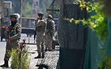 Indian paramilitary troopers stand guard along a street in Srinagar, on the Indian-administered side of Kashmir, on April 30, 2025. (Tauseef MUSTAFA / AFP)