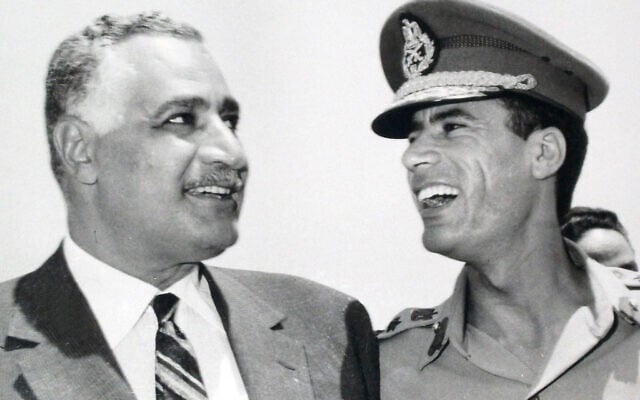 In this undated 1969 photo, Egypt's President Gamal Abdel Nasser, left, is seen with Libyan leader, Col.  Muammar Gaddafi, in Suez, Egypt. (AP Photo/ Farouk Ibrahim)
