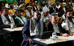 South African President Cyril Ramaphosa, first row left, listens in Johannesburg on January 26, 2024, to the ruling from the top UN court that harshly criticized Israel's war against the Hamas terror group in Gaza. (AP Photo)