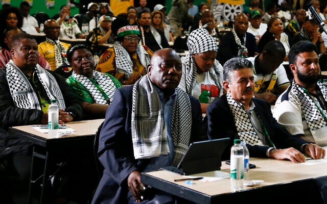 South African President Cyril Ramaphosa, first row left, listens in Johannesburg on January 26, 2024, to the ruling from the top UN court that harshly criticized Israel's war against the Hamas terror group in Gaza. (AP Photo)