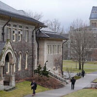 People walk on the campus of Cornell University in Ithaca, New York, February 2, 2024. (AP Photo/Seth Wenig)