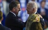 Then-US President Joe Biden, right, hugs his son Hunter Biden during the Democratic National Convention Monday, August 19, 2024, in Chicago, Illinois. (AP Photo/Matt Rourke)