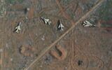 File: Seized Syrian Air Force planes are seen in the aftermath of the opposition's takeover of the Hama military airport on December 6, 2024. (AP Photo/Ghaith Alsayed)