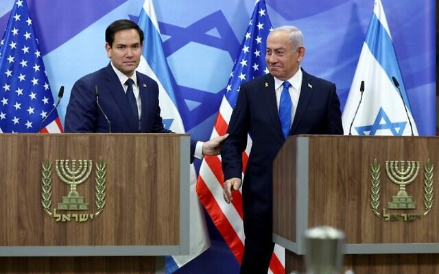 US Secretary of State Marco Rubio, left, and Prime Minister Benjamin Netanyahu are seen at a news conference at the Prime Minister's Office in Jerusalem, February 16, 2025. (Evelyn Hockstein/Pool Photo via AP)
