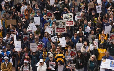 Students and faculty rally at the University of California, Berkeley campus to protest the Trump administration's crackdown on universities over antisemitism, on March 19, 2025, in Berkeley, Calif. (AP Photo/Godofredo A. Vásquez)
