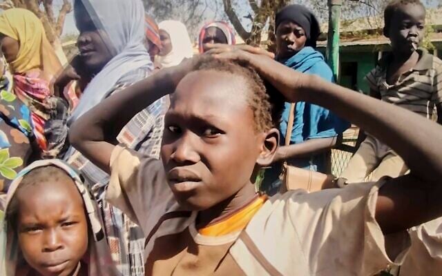 In this video frame, Sudanese displaced children take shelter in a school after being evacuated by the Sudanese army from areas once controlled by the paramilitary Rapid Support Forces (RSF) in Omdurman, Sudan, located across the Nile River from Khartoum, on Sunday, March 23, 2025. (AP Photo)