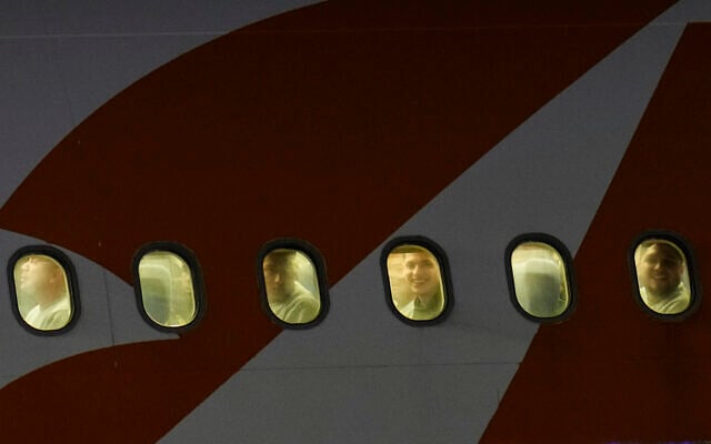 Venezuelan migrants deported from the United States peer through their plane window as they arrive at Simon Bolivar International Airport in Maiquetia, Venezuela, March 24, 2025. (AP Photo/Ariana Cubillos) Venezuelan migrants deported from the United States peer through their plane window as they arrive at Simon Bolivar International Airport in Maiquetia, Venezuela, March 24, 2025. (AP Photo/Ariana Cubillos)