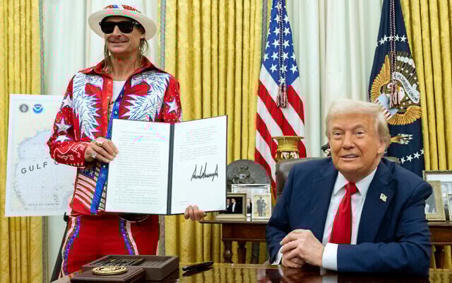 Kid Rock holds a signed executive order regarding ticket scalping after US President Donald Trump signed it in the Oval Office of the White House in Washington, Monday, March 31, 2025. (Pool via AP) Kid Rock holds a signed executive order regarding ticket scalping after US President Donald Trump signed it in the Oval Office of the White House in Washington, Monday, March 31, 2025. (Pool via AP)