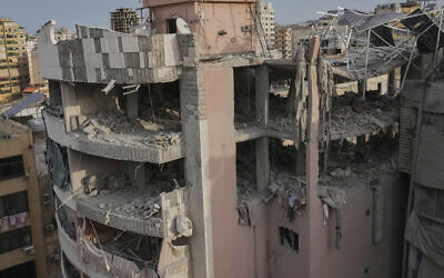 Damaged apartment buildings are seen after being struck earlier by an Israeli attack in Dahiyeh, a southern suburb of Beirut, Lebanon, April 1, 2025. (AP Photo/Hussein Malla)