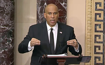 In this image provided by Senate Television, Sen, Cory Booker, Democrat-New Jersey speaks on the Senate floor, April 1, 2025. (Senate Television via AP)