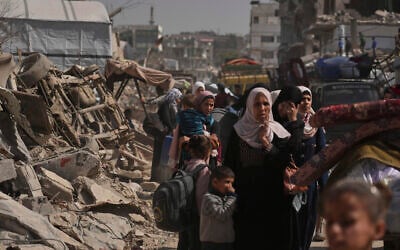 Displaced Palestinians flee from Shijaiyah, Gaza, on Thursday, April 3, 2025, after the Israeli military issued evacuation orders in the area. (AP Photo/Jehad Alshrafi)